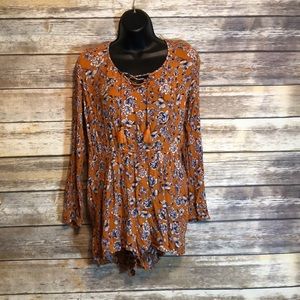 Orange and blue floral romper size large